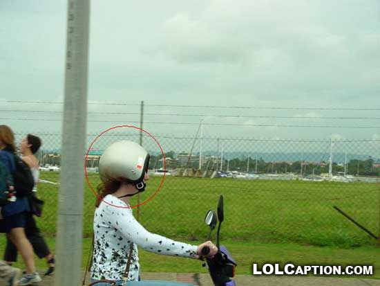 yea-its-a-woman-lolcaption-funny-fail-pics-motorbike-helmet-backwards