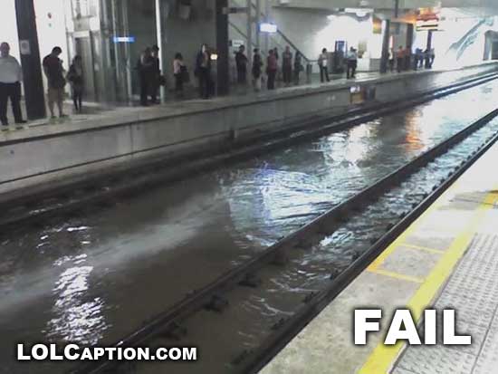 lolcaption_funny_fail_pics_water_Train_tracks_fail_Flooded